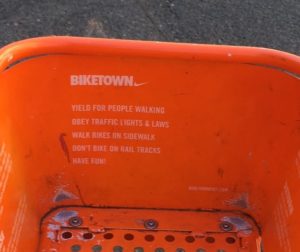 A list of rules printed on all BIKETOWN bikes: Yield for people walking, obey traffic lights and laws, walk bikes on sidewalk, don't bike on rail tracks, have fun! But these rules don't accurately represent Oregon bike law.