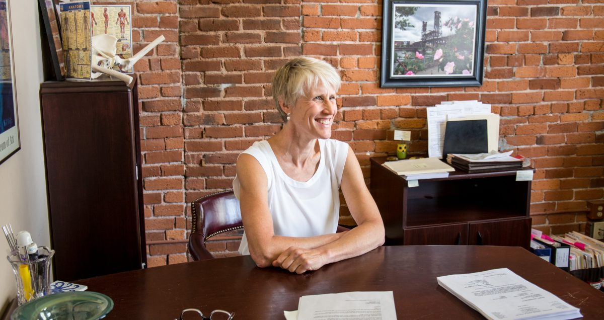 Cynthia Newton at her desk