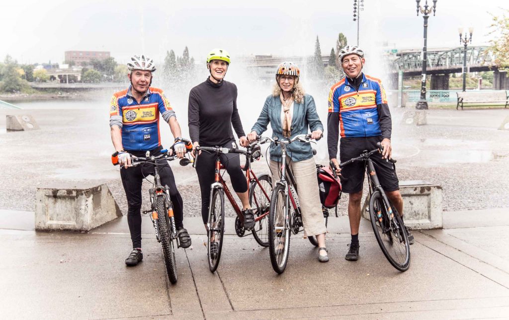 The four partners of TCNF law on their bikes