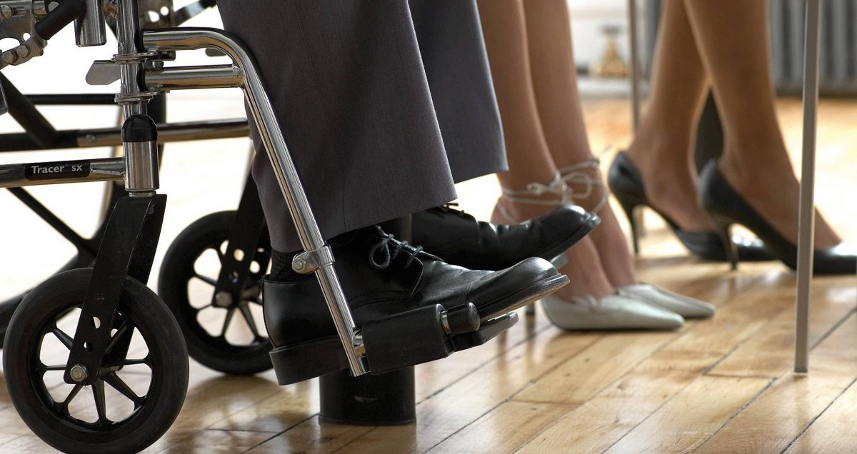 Shot of man's feet in wheel chair