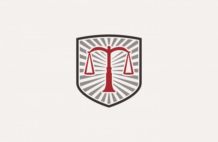 TCNF's logo with the scales of justice