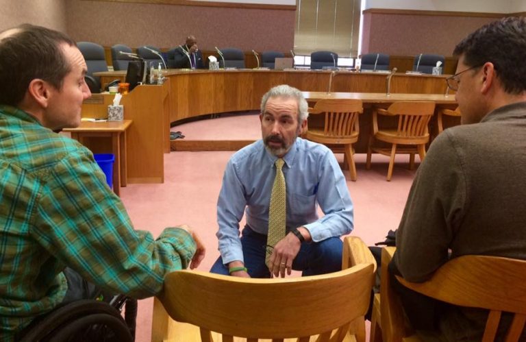 Max Woodbury with fellow Restore Justice for Survivors Coalition members at a press conference in Salem.