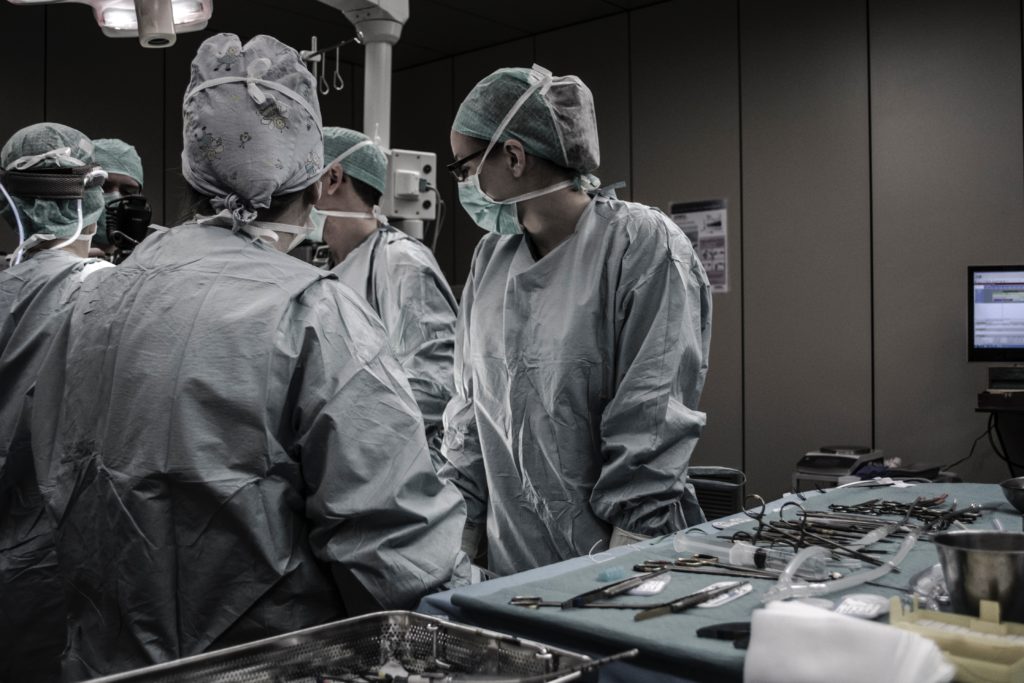 image of a surgical team in an operating room