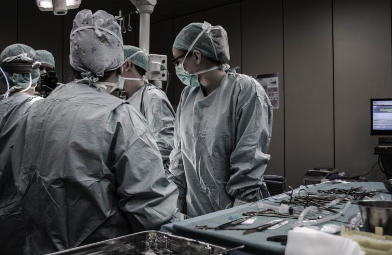 image of a surgical team in an operating room